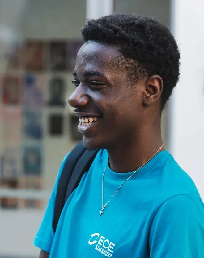 A smiling student on the ECE engineering school campus in Bordeaux